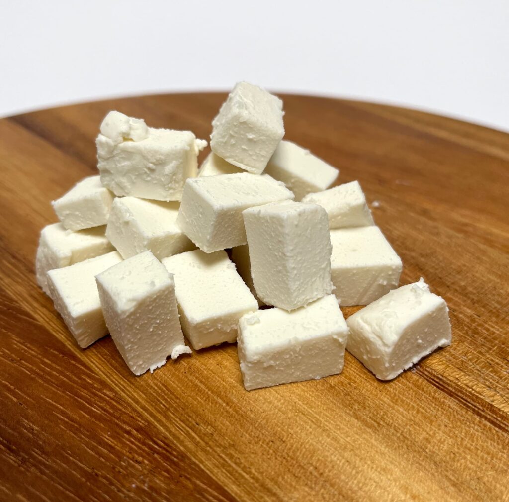 Feta-like vegan cheese by Simply-V cut in small blocks