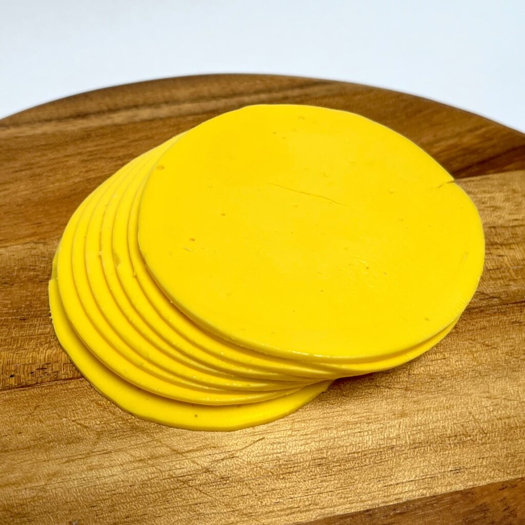 Top view of Intense slices vegan cheese by Vegan Deli