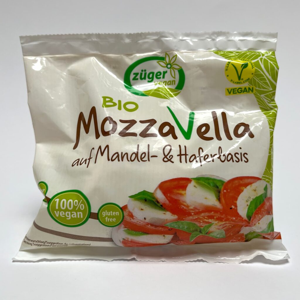 Front of packaging of Mozzavella vegan cheese by Zuger Vegan