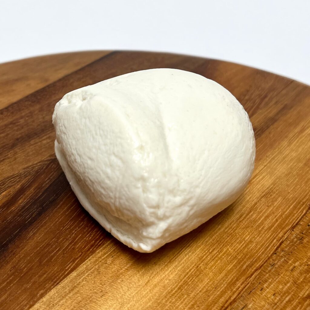 Top view of Mozzavella vegan cheese by Zuger Vegan