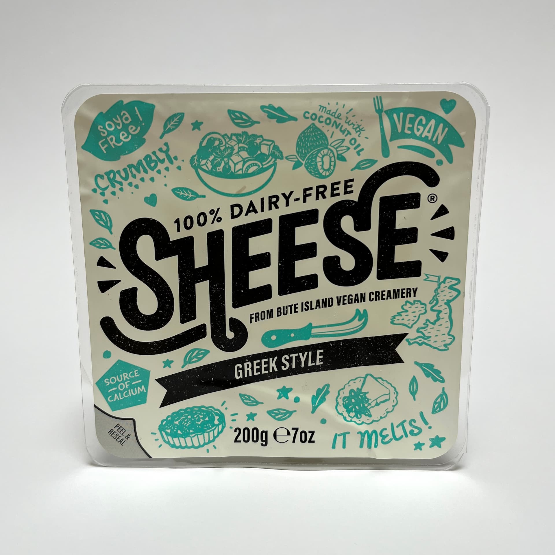 Front of packaging of Sheese Greek Style vegan cheese by Bute Island