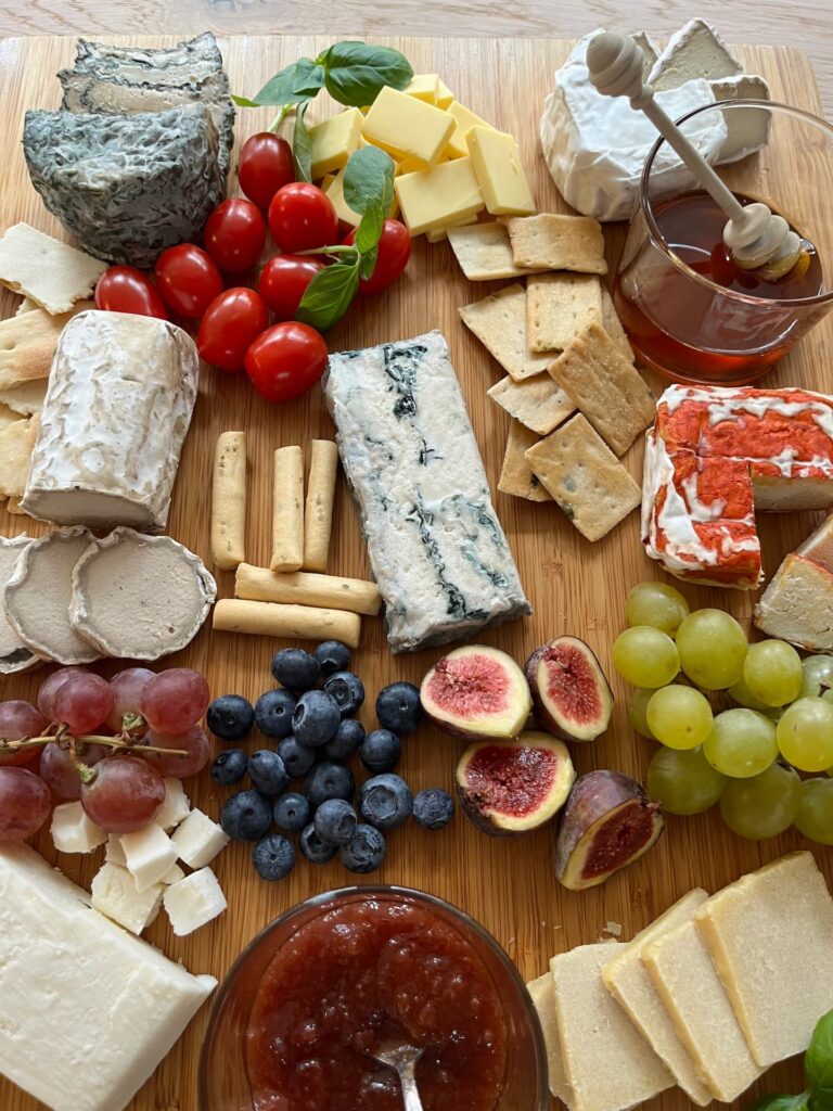 Vegan cheese platter with various types of vegan cheese