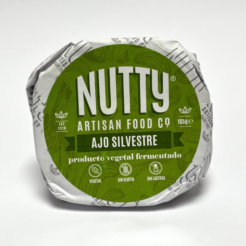 Front of packaging of Wild Garlic vegan cheese by Nutty Artisan Foods