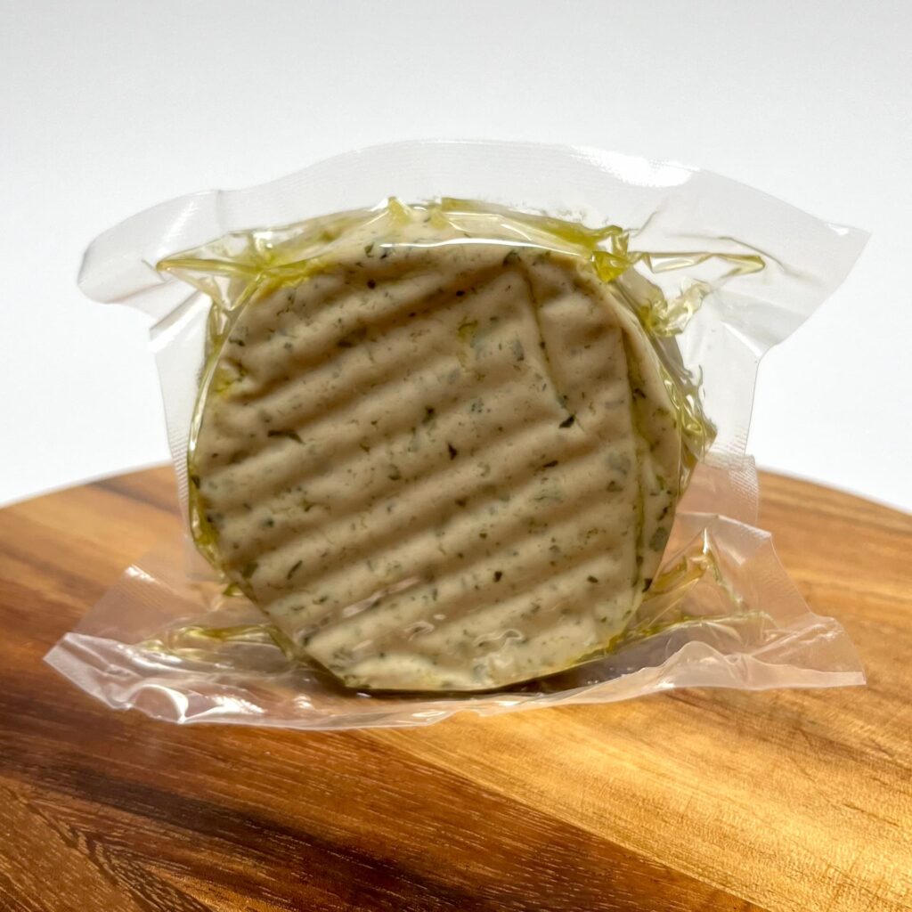 Inner packaging of Wild Garlic vegan cheese by Nutty Artisan Foods