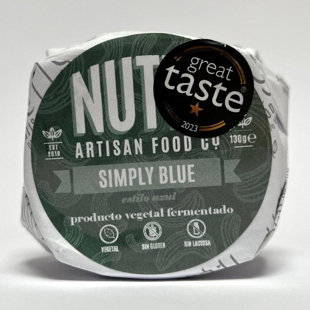 Front of packaging of Simply Blue vegan cheese by Nutty Artisan Foods