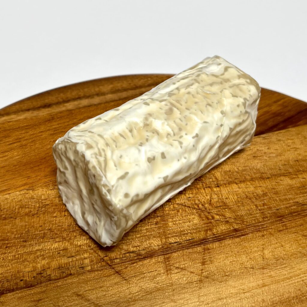 Top view of Simply G.O.A.T vegan cheese by Nutty Artisan Foods